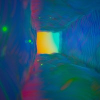 an image of a rainbow colored tunnel